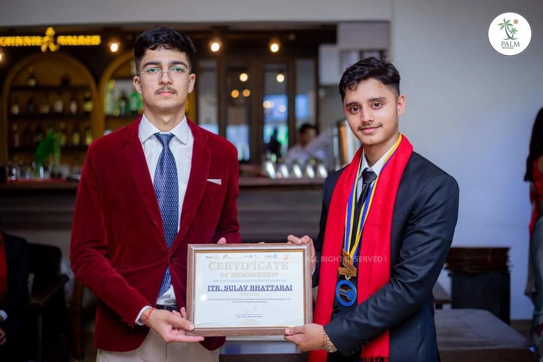 Samir receiving an award